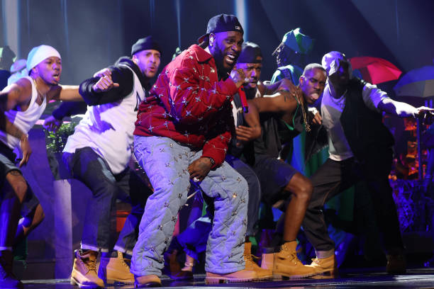 LOS ANGELES, CALIFORNIA - FEBRUARY 04: Burna Boy onstage during the 66th GRAMMY Awards at Crypto.com Arena on February 04, 2024 in Los Angeles, California. (Photo by Kevin Mazur/Getty Images for The Recording Academy)