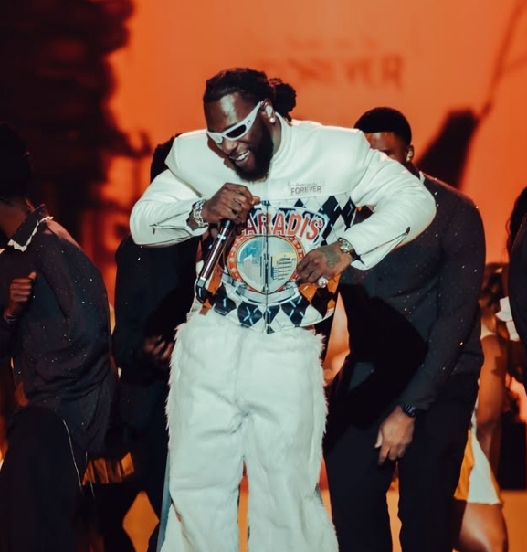 Burna Boy performing at the Paris La Defense Arena